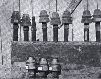 THESE INSULATORS CARRIED 10,000 VOLTS FOR SIX YEARS NEAR THE COLTON CEMENT WORKS