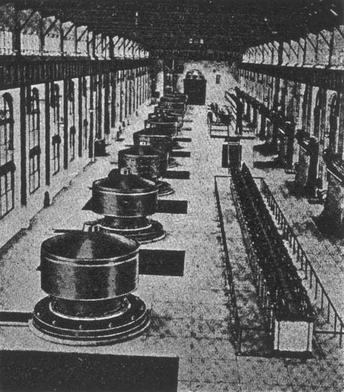 INTERIOR OF A NIAGARA FALLS POWER HOUSE, SHOWING 10 VERTICAL 5,000-HORSEPOWER GENERATORS.
