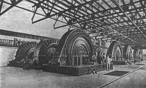 INTERIOR OF A NIAGARA FALLS GENERATING STATION, SHOWING 10,000 HORSEPOWER GENERATORS.