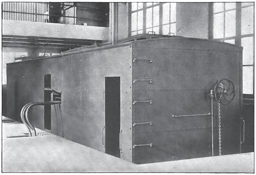 FIG. 14. � A SUB-STATION CAR CONNECTED UP IN THE INTERIOR OF A PERMANENT SUB-STATION. THE CAR IS BUILT OF STEEL AND RESEMBLES A FREIGHT CAR IN APPEARANCE