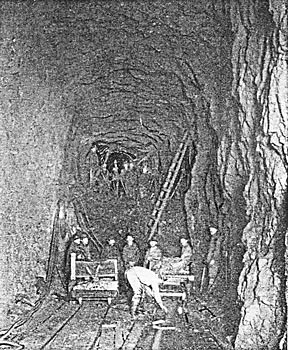 EXCAVATING THE TAILRACE TUNNEL.