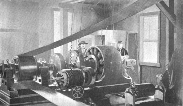 Plate VI. Motor in operation.  Standard Con