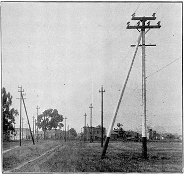 THE DOUBLE POLELINE ENDS AT THE BERKLEY-OAKLAND CITY LIMITS.