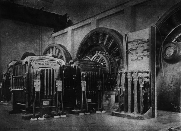 Fig. 1.�FIRST INSTALLATION OF PITTSBURG REDUCTION COMPANY�FOUR ROTARY TRANSFORMERS, 115 VOLTS  -- ALTERNATING TO 160 VOLTS�DIRECT CURRENT. TWO-STATIC TRANSFORMERS, 2000 115 VOLTS�INSULATING PORCELAIN TUBES.