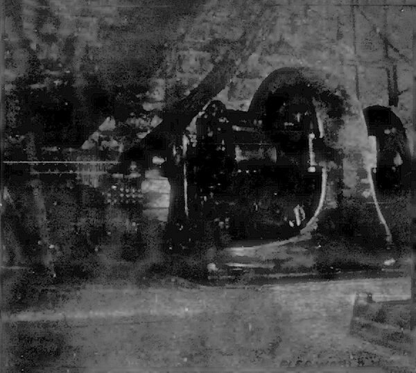 Fig. 3.�ALUMINUM CONDUCTORS AND ONE OF THE 560-KW, 280-VOLT GENERATORS.