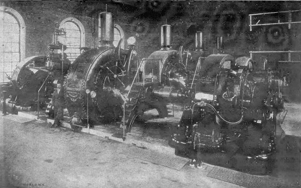 Fig. 4.�NEW POWER PLANT OF THE NIAGARA FALLS HYDRAULIC POWER & MANUFACTURING COMPANY, SHOWING TURBINES, GOVERNOR AND STREET RAILWAY GENERATORS.