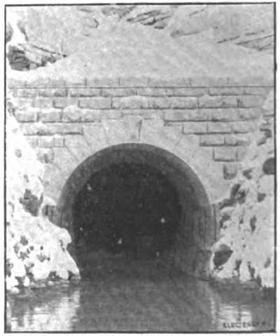 VIEW OF ITS PORTAL BELOW THE FALLS.