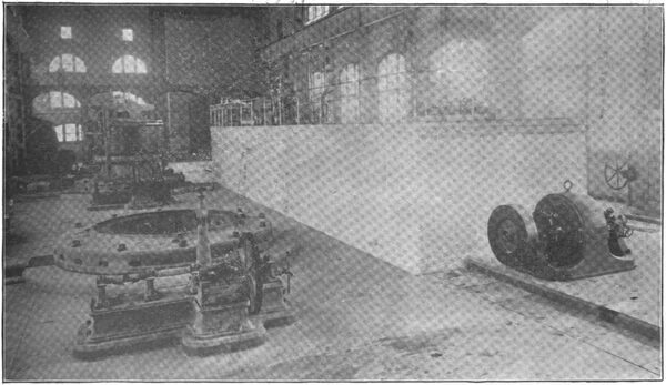 VIEW IN THE POWER HOUSE, SHOWING GENERATOR WITH ARMATURE EXPOSED, AND THE SWITCHBOARD GALLERY.