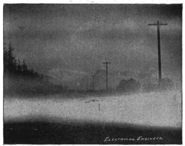 POLE LINE THROUGH SAN ANTONIO CANYON � MOUNTAIN FOG IN FOREGROUND.