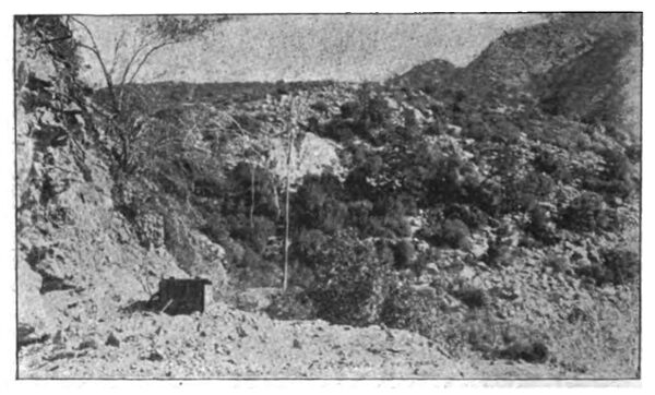 OUTLET OF THE TUNNEL. PIPE LINE IN CENTRE OF PICTURE.