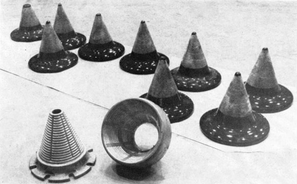 CONES are cemented together to form a laminated construction described as having unusual strength characteristics.