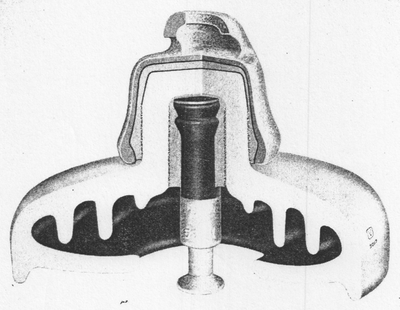 PORCELAIN BOWL is welded ceramically to the inside of a standard 10-in. suspension insulator to create a dead air space.