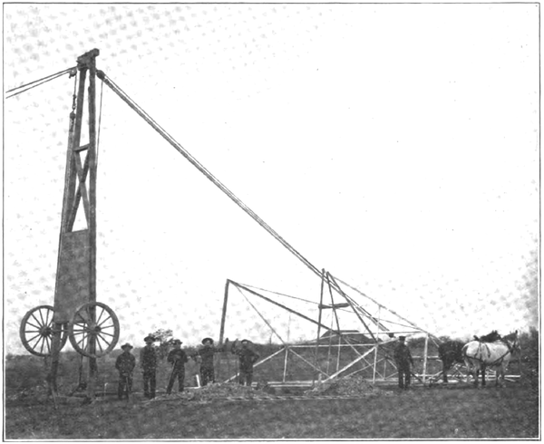 READY TO RAISE A TOWER WITH THE DERRICK WAGON, NIAGARA FALLS AND TORONTO TRANSMISSION LINE.