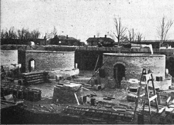 KILNS, WITH CONCRETE COAL CHUTES BETWEEN.