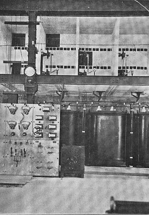 TRANSFORMER DISCONNECTING SWITCHES , SHOWING HIGH TENSION BUSBAR COMPARTMENTS AND LEVER MECHANISM.