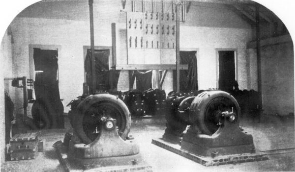 FIGURE 18�AN INTERIOR VIEW OF THE SUB-STATION, SHOWING HIGH POTENTIAL SWITCHBOARD, STEP-DOWN TRANSFORMERS, BLOWERS, INDUCTION MOTORS AND ARC DYNAMOS.