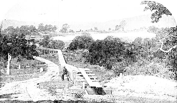 FIGURE. 5 � CREST OF RESERVOIR MOUNTAIN, SHOWING RESERVOIR AND FLUME LEADING THERETO.
