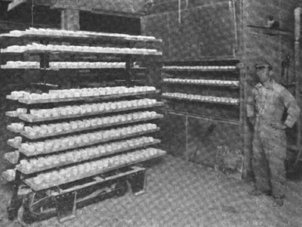 Fig. 3. The Truck Load Arriving at the Dryer.  After Unloading, Which Takes Only a Few Minutes, the Entire Rack Is Taken Back to Be Filled Again.