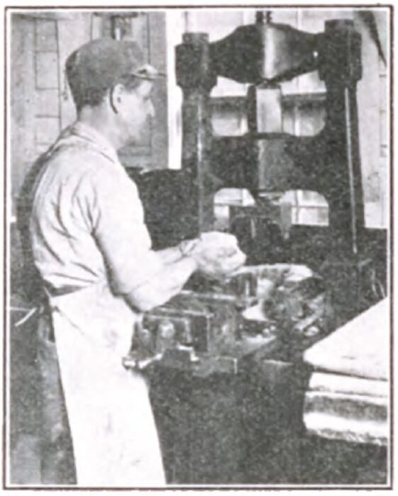 Fig. 2, Filling the Die for Transformer Cutout Case Manufacture