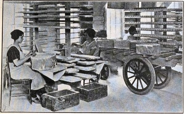 Fig. 7, Cleaning and Placing Department, Showing Type of Truck Used to Haul Loaded Saggers
