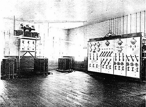 FIGURE 5. - THE SUBSTATION SHOWING LIGHTNING ARRESTERS, HIGH POTENTIAL SWITCHBOARD, TRANSFORMERS AND THE DISTRIBUTING SWITCHBOARD.