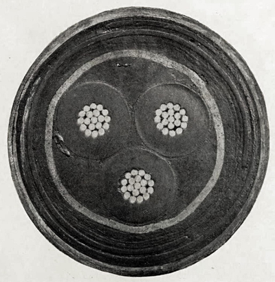 FULL SIZE RUBBER-INSULATED, STEEL-ARMOURED, THREE-CONDUCTOR CABLE FOR SUBMARINE WORK, USED BY THE INTERBOROUGH RAPID TRANSIT COMPANY OF NEW YORK, UNDERNEATH HARLEM RIVER.