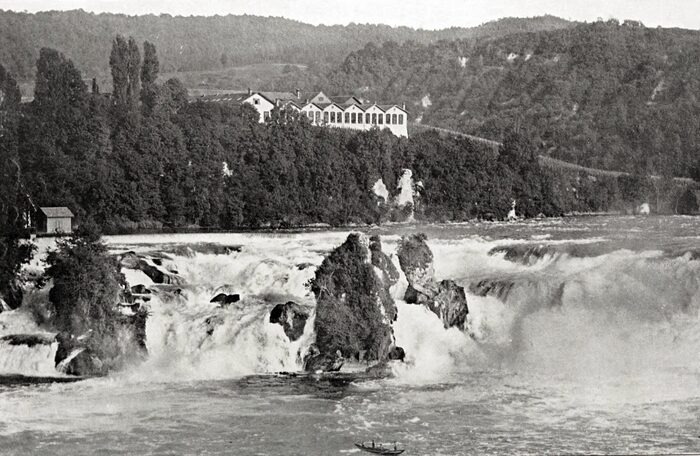 THE FALLS OF THE RHINE AT NEUHAUSEN, SWITZERLAND. THREE THOUSAND HORSE-POWER ARE HERE DEVELOPED AND USED IN THE MAKING OF ALUMINUM