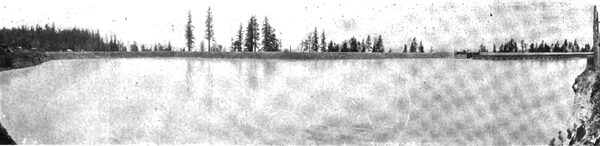 FIG. 4. � PANORAMIC VIEW OF WATER INLET, FOREBAY AND PARTIALLY FILLED RESERVOIR.