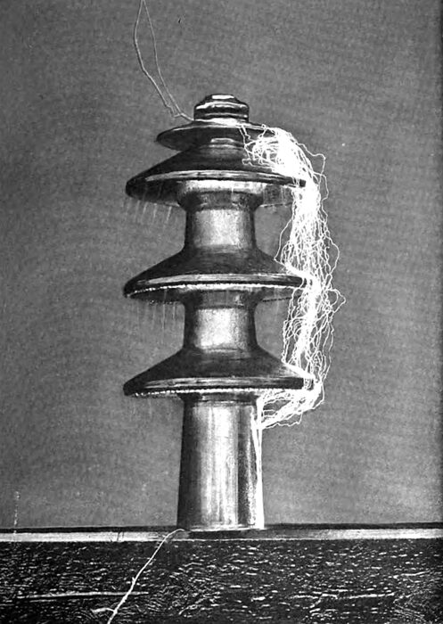 ARCING AT 198 KILOVOLTS UNDER A SPRAY OF WATER