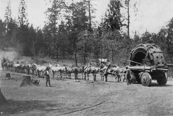 FIG. 1. � HAULING THE UPPER PART OF AN ARMATURE OF A 5000-KW. GENERATOR TO ONE OF THE MOUNTAIN POWER HOUSES.