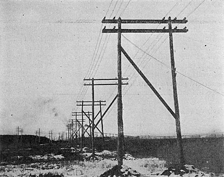 FIG. 6. � TRANSMISSION 13,000-VOLT LINES ACROSS THE JERSEY MARSHES, CONNECTING MARION STATION WITH NEWARK PLANTS.
