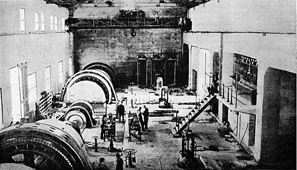FIG. 22. � INTERIOR VIEW OF POWER HOUSE SHOWING THREE MAIN UNITS AND ONE OF THE EXCITER UNITS.