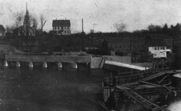Fig. 2 -- POWER HOUSE, ONE END OF DAM AND COFFERDAM AT POINT OF FINAL CLOSURE.