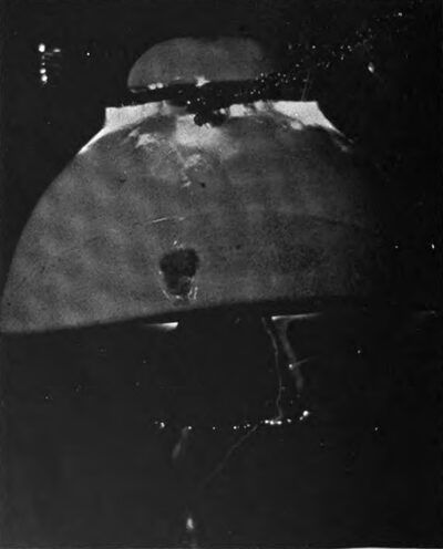 No. 4.--The Breaking Down of a High Potential Insulator at 90,000 - Volts, Showing Material Ejected from Point of Rupture.