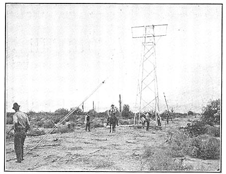 Fig. 6 - Tower Being Bolted to Anchor at the Base.