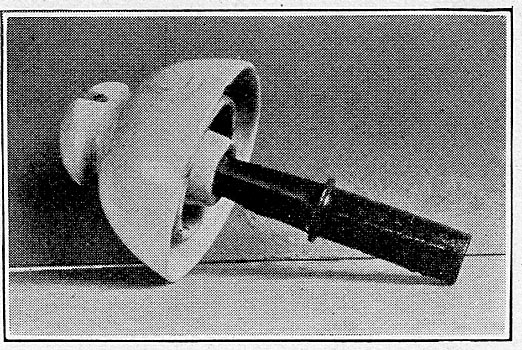 Porcelain insulator and iron pin used on 30,000-volt line