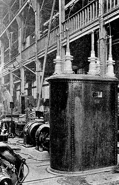 A 50-Kilowatt Transformer -- 250 To 250,000 Volts -- On The Testing Floor.