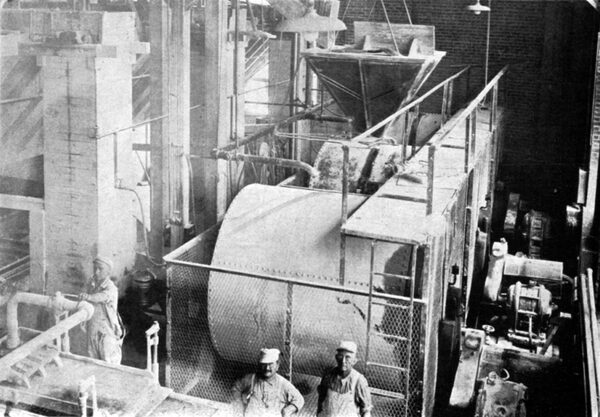 Excellent View of Slip House Showing Mill Being Filled and Position of Raw Material Bins and Elevators.