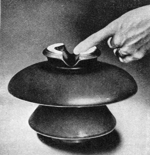 \"Conduction-glazed Silentype\" insulator, supplementing the line of metallized Silen-type -- includes all sizes of high-voltage pin types, both multiparts and uniparts -- also low-voltage pin types. Ohio Brass Co., Mansfield, Ohio.