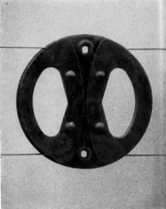 Transposition plate. The open wire circuit is locked under the raised wings of the plate which prevents the wire from running in the event of an open.