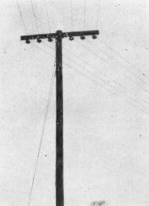 Corner construction with sufficient angle to use the combination long nuts and the single circuit assembly insulators mounted on the sides.