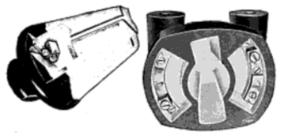 TRANSFORMER PRIMARY CUT-OUT, SHOWING TERMINALS, PLUG WITH GROOVE FOR FUSE AND LOCKING DEVICE