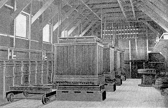 FIG. 8. - STEP-DOWN TRANSFORMERS AND TRUCKS FOR HANDLING.