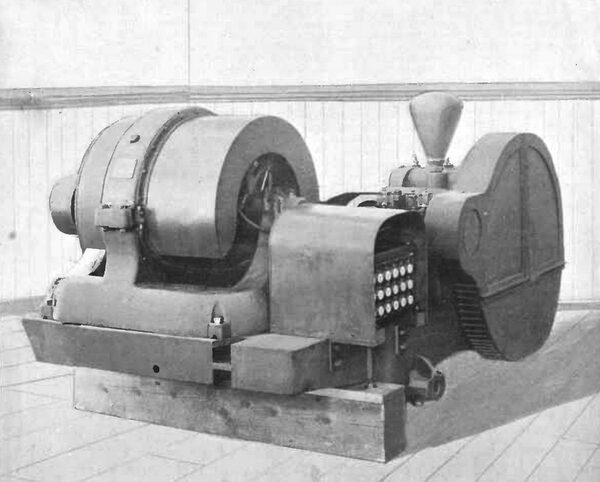 A DIRECT CURRENT ELECTRIC MOTOR, GEARED TO A PUMP.