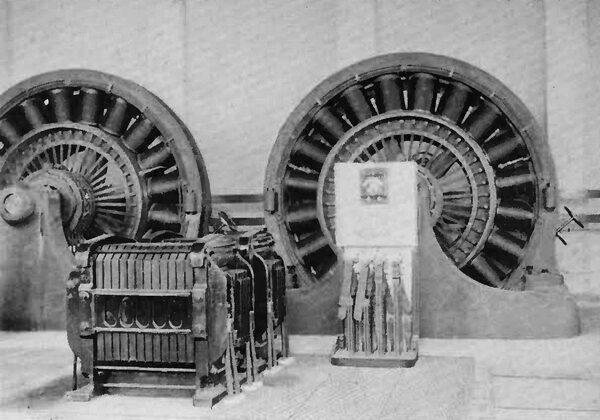 TWO OF THE ROTARY CONVERTERS AND ALSO TWO OF THE STATIC TRANSFORMERS IN THE PITTSBURGH REDUCTION COMPANY S PLANT.