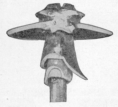 FIG. 2 - PIN INSULATOR DESTROYED BY POWER ARC OF 500 AMP. LASTING FIVE SECONDS