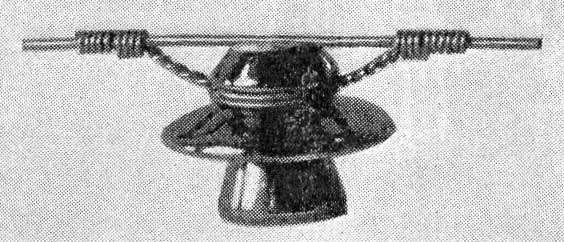 NEW TIE KEEPS LINE WIRE FROM BEING PULLED OFF INSULATOR AND CAN BE SERVED WITHOUT CUTTING WIRE.