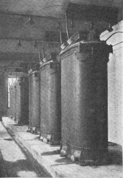 SIX 1,333-KILOWATT TRANSFORMERS IN DRAINAGE CANAL POWER HOUSE.