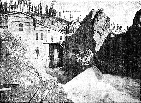 FIGURE 4. - REAR VIEW OF POWER HOUSE SHOWING DRAUGHT-TUBE AND TAIL RACE.