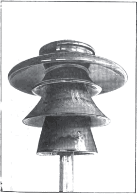 PLATE 1 - Transmission Line Insulator.  80,000 Volts Working Pressure.